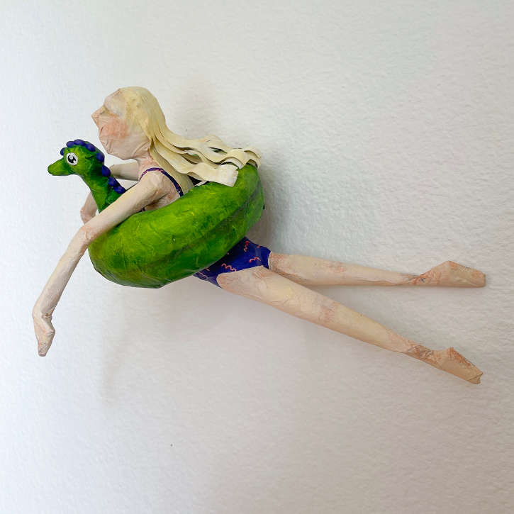 Floating, Paper Mache Girl Floating on Intertube